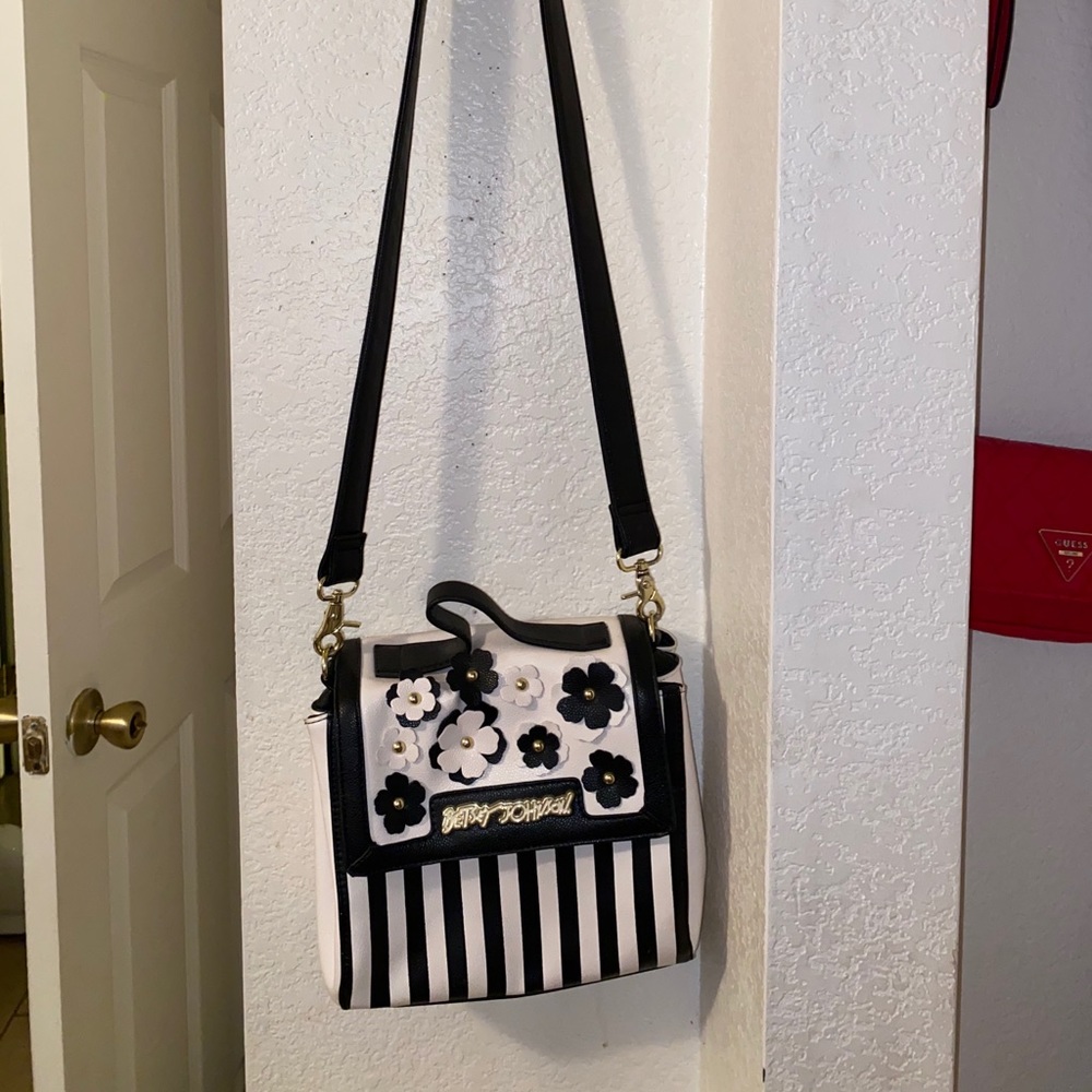 Betsy Johnson striped white and black purse.